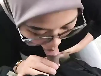 Malaysian babe Awek Tudung takes on her boy's rigid knob in a red-hot rear end-fashion session